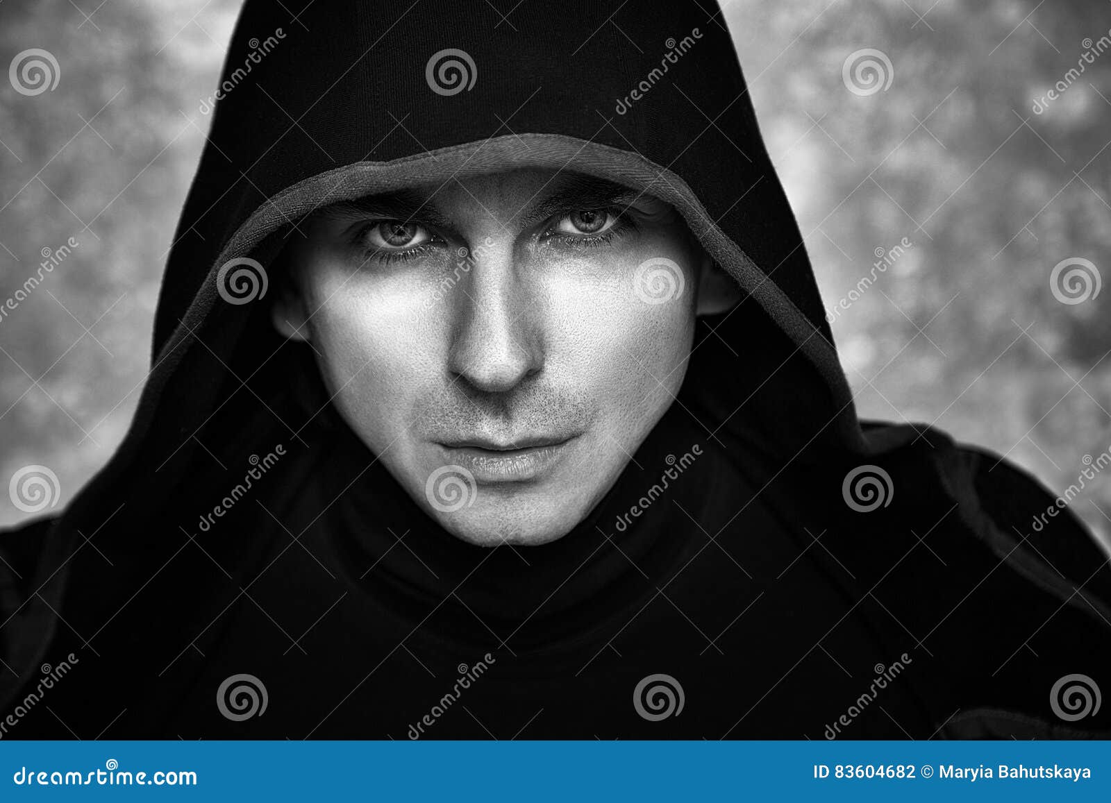 mysterious man in black hoodie. fantasy guy.