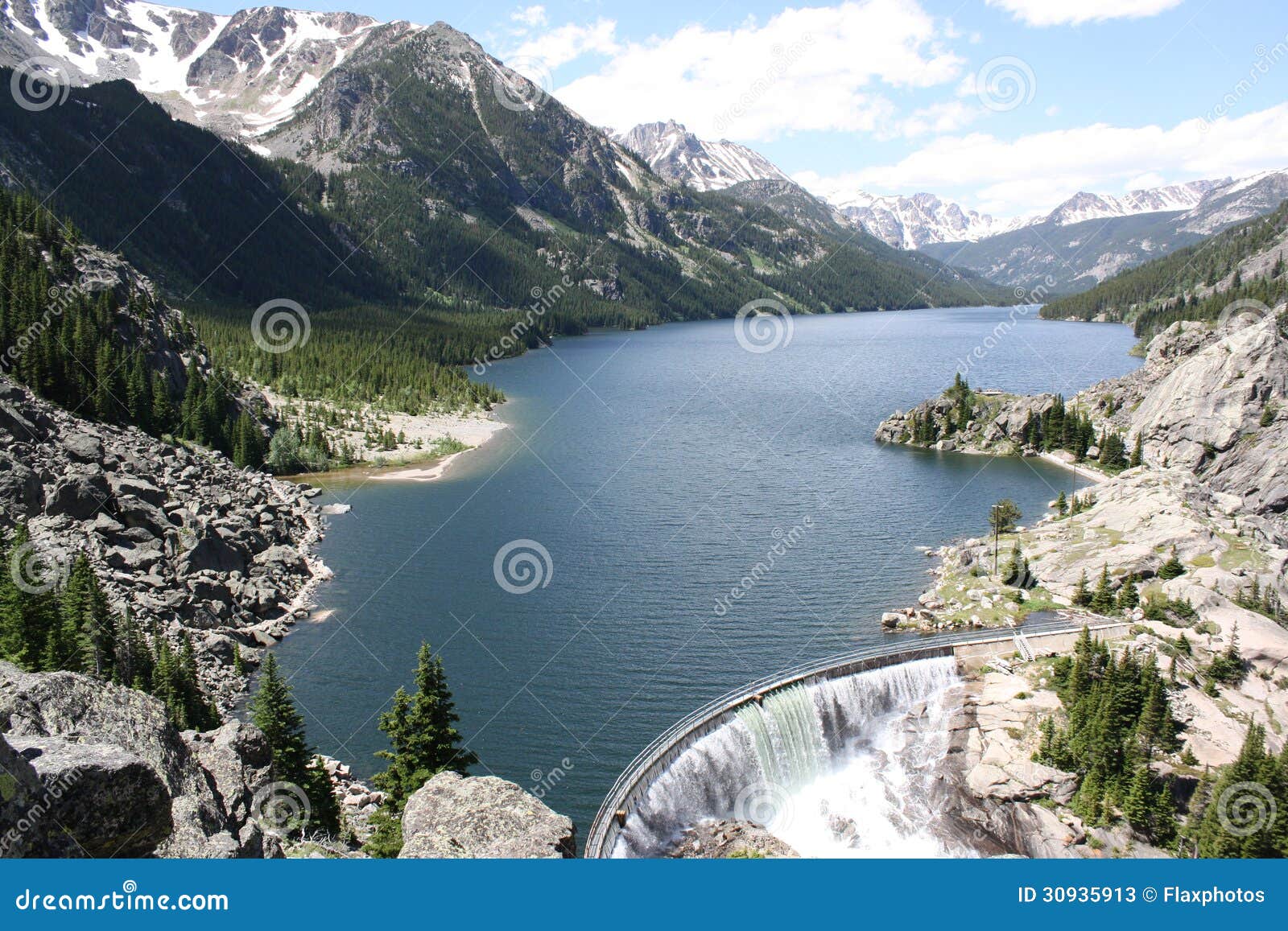 mystic lake dam and beartooth mountains.
