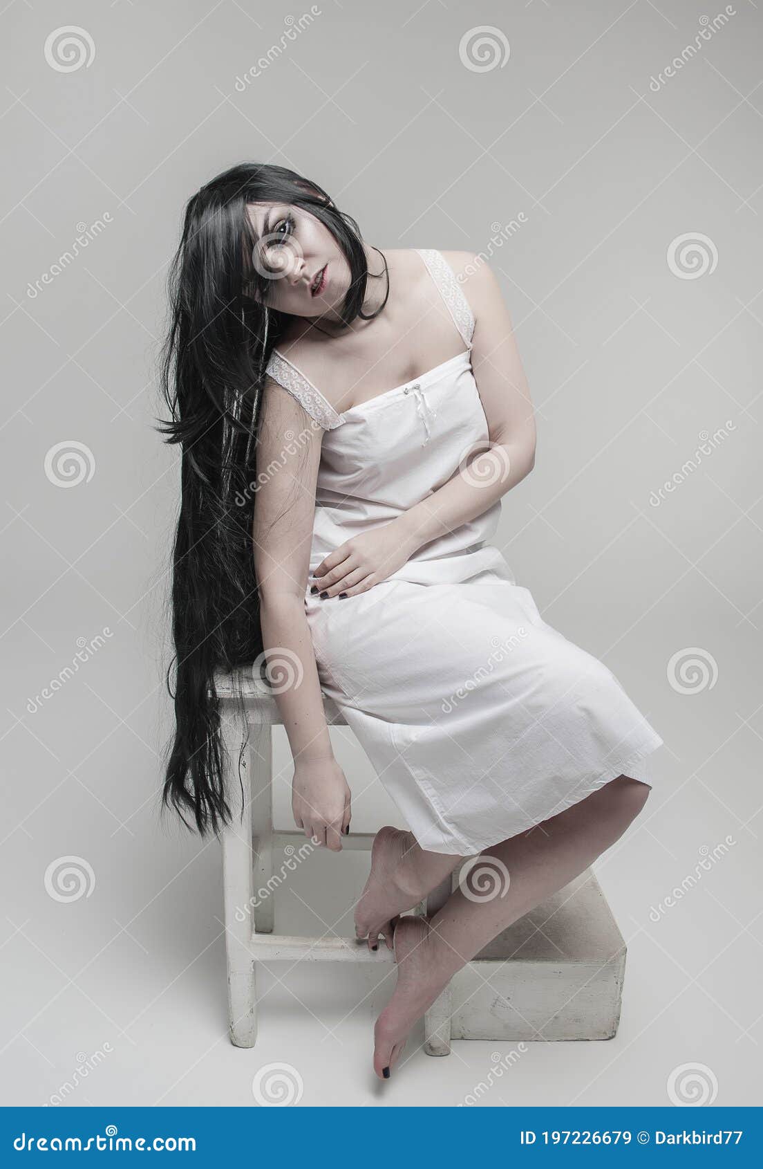 Mystical Ghost Woman with Black Long Hair Sitting on Chair on Gray  Background Stock Image - Image of drama, ghostly: 197226679