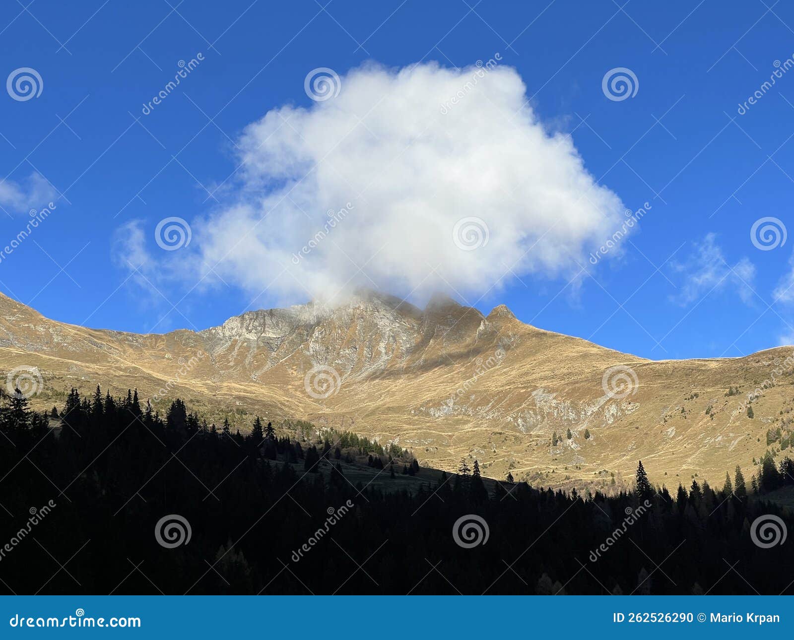 mystical low autumn clouds and typical mountain fog in swiss alpine area over the calfeisental valley, vÃÂ¤ttis - switzerland