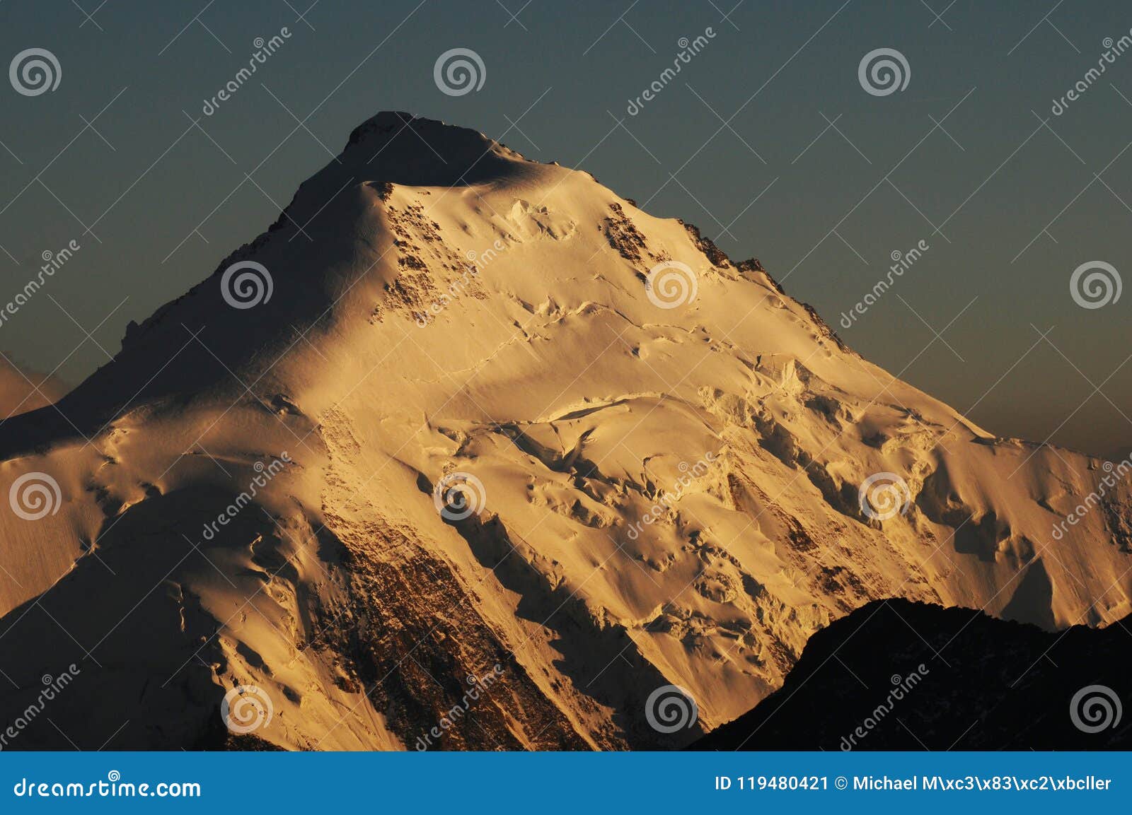 mÃÂ¶nchshÃÂ¼tte: global clima change: bernese swiss mountain peak with melting glacier at sunset near grindelwald