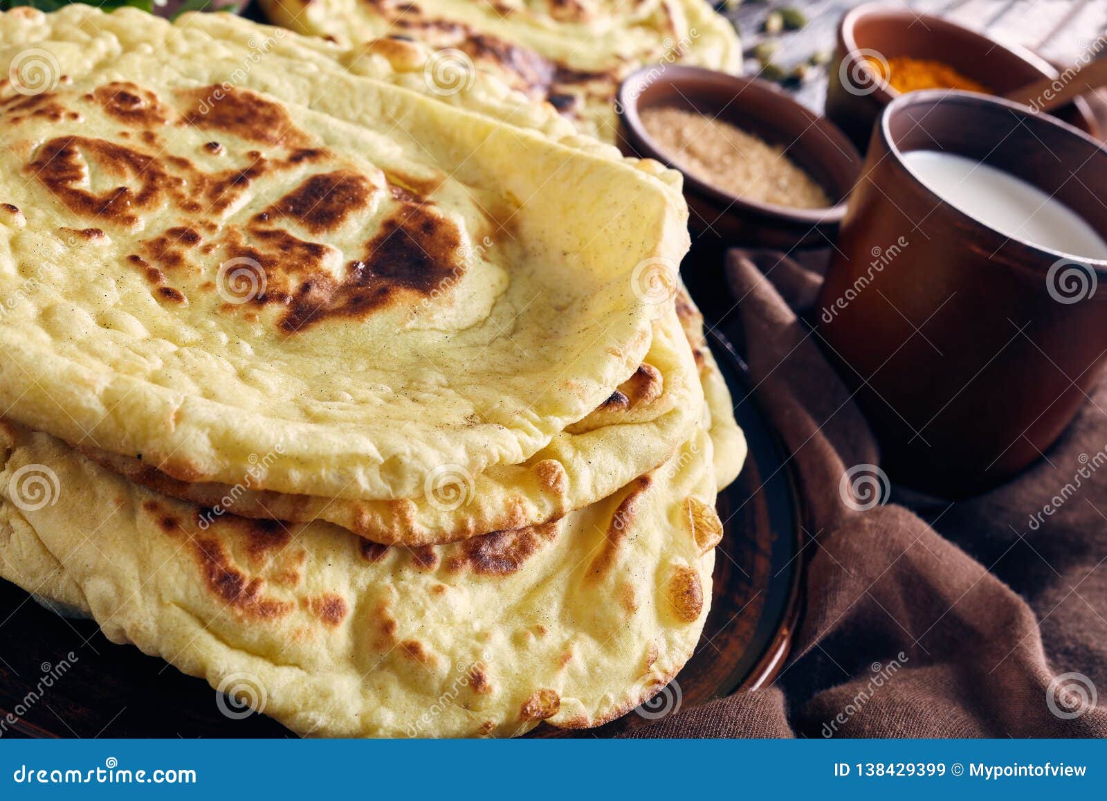 Naan, Indian Flatbread, Pita On A Table RoyaltyFree Stock Image