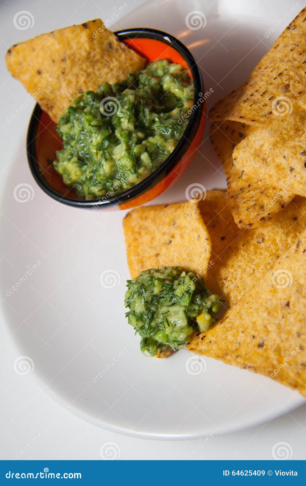 Nacho chips and guacamole stock image. Image of fast 64625409