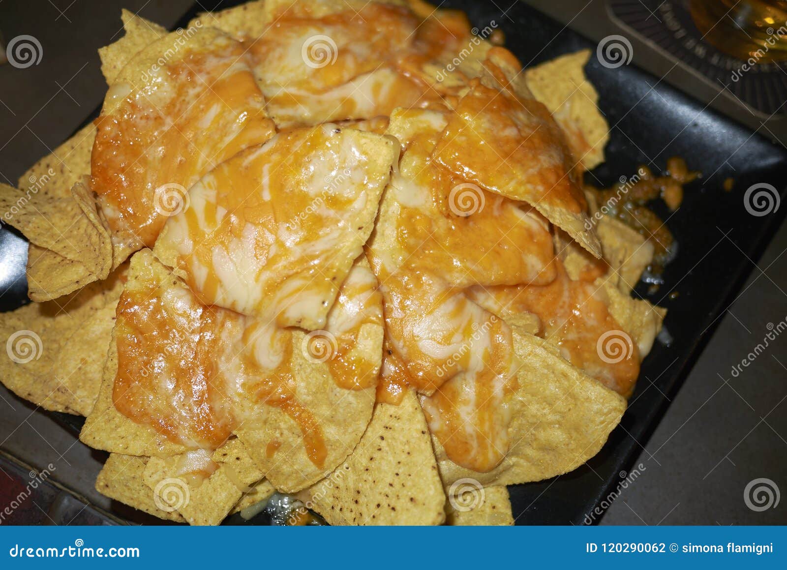 Nachos with cheddar cheese stock photo. Image of nacho 120290062