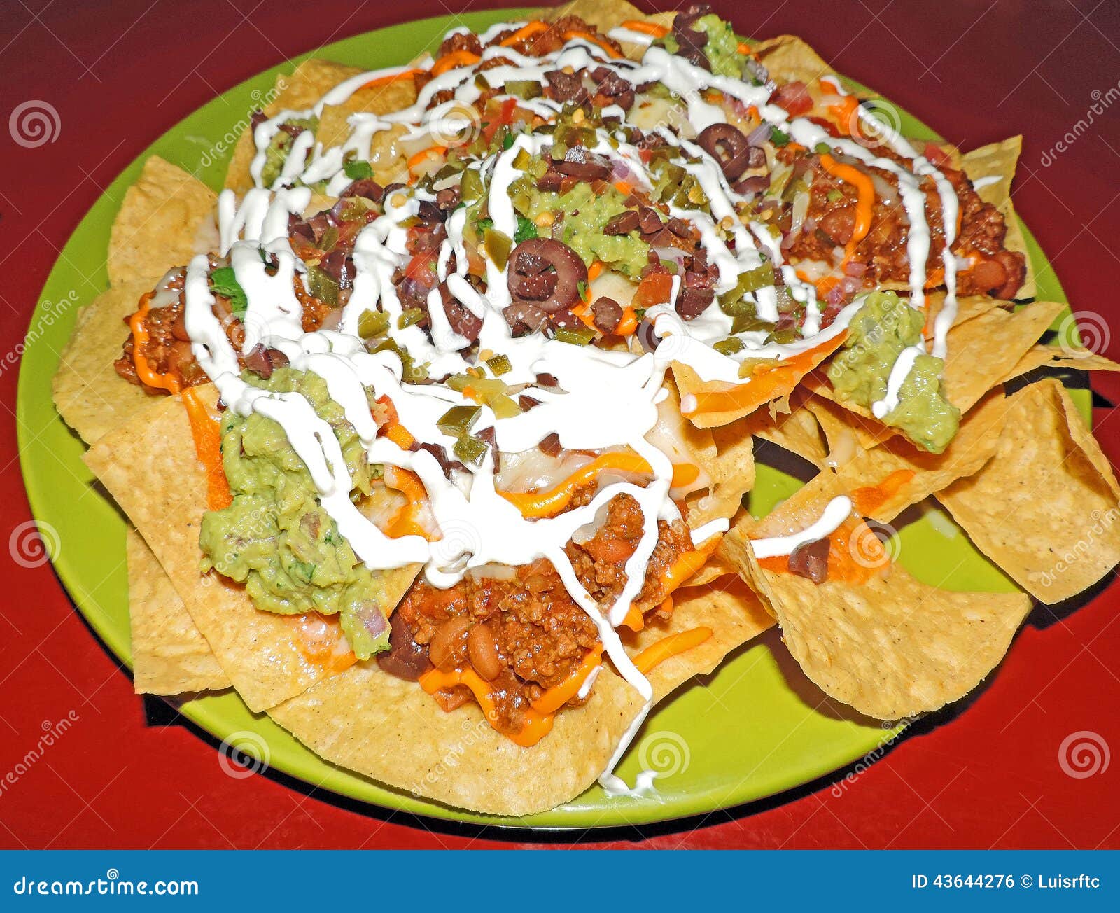 Nachos with chili beans stock photo. Image of spicy, colorful 43644276