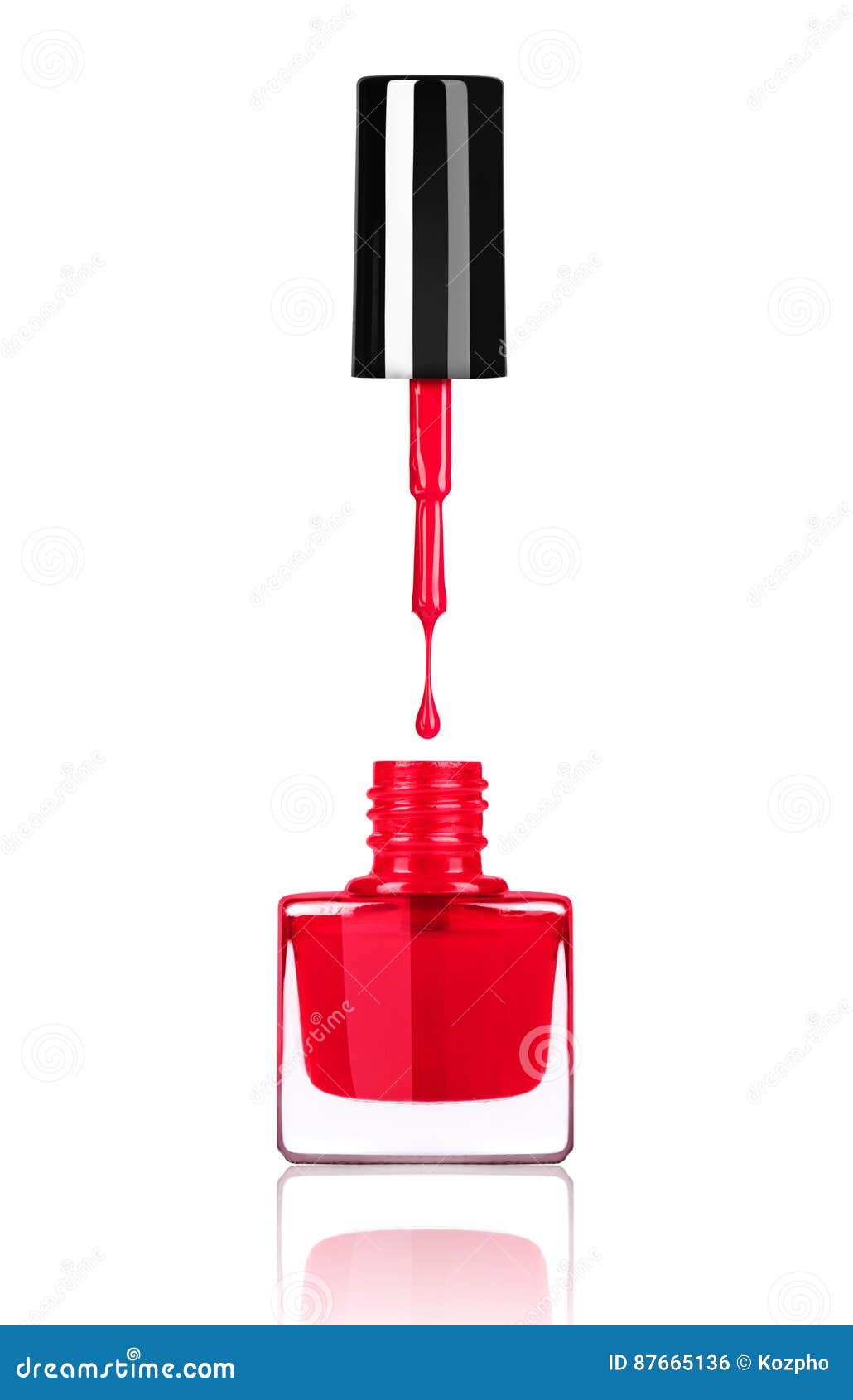 Nail Polish Dripping From Brush Into Bottle On White Stock Photo
