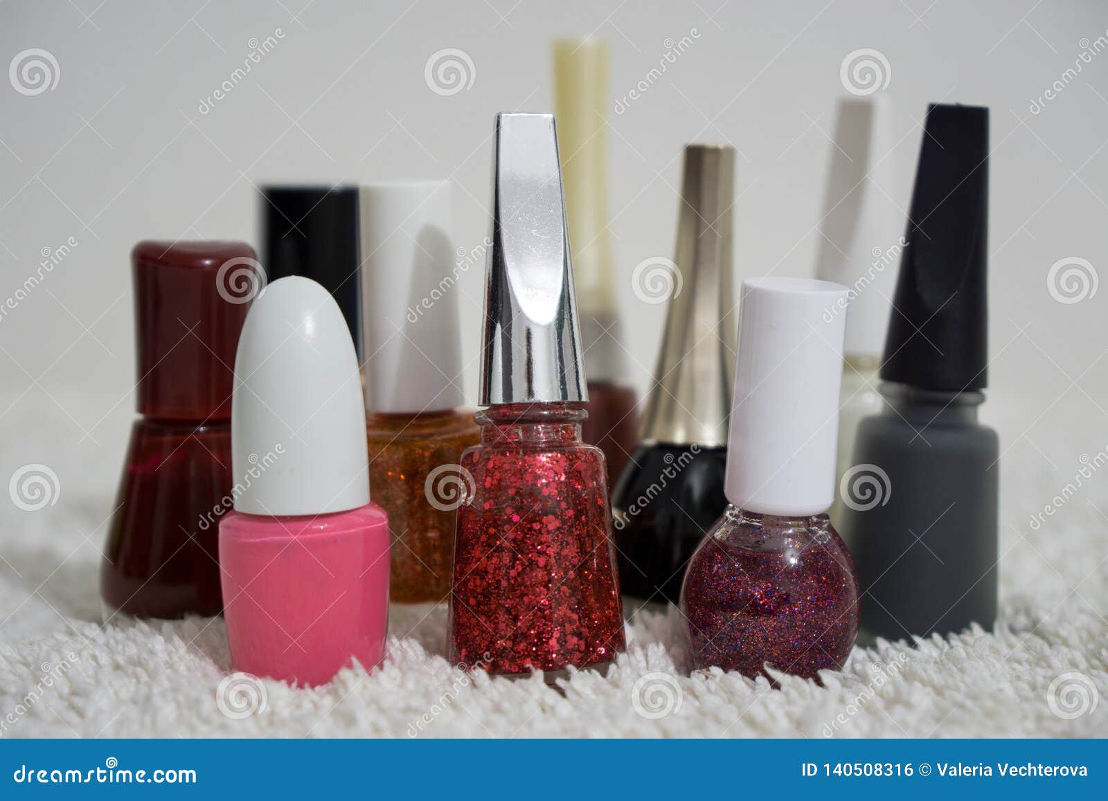 Nail Polishes of Many Colors on a Table. Stock Photo - Image of ...
