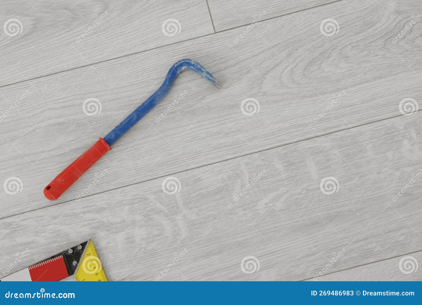 Nail Puller on Laminate Flooring, Top View. Space for Text Stock Image