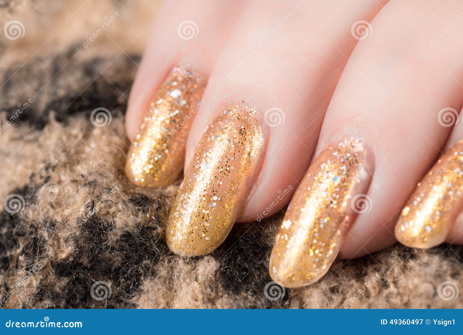 Nails in gold stock image. Image of female, bright, beauty 49360497