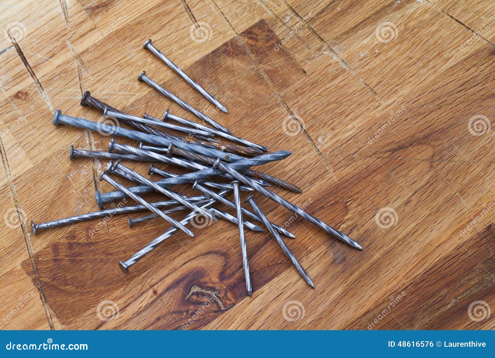 Nails on wood table stock photo. Image of hardware, nails 48616576