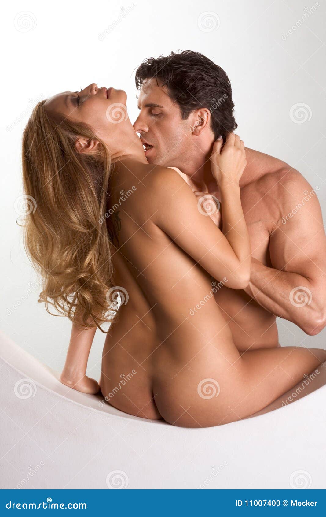 Naked Interracial Couple Kiss in Sexual Games Stock Photo