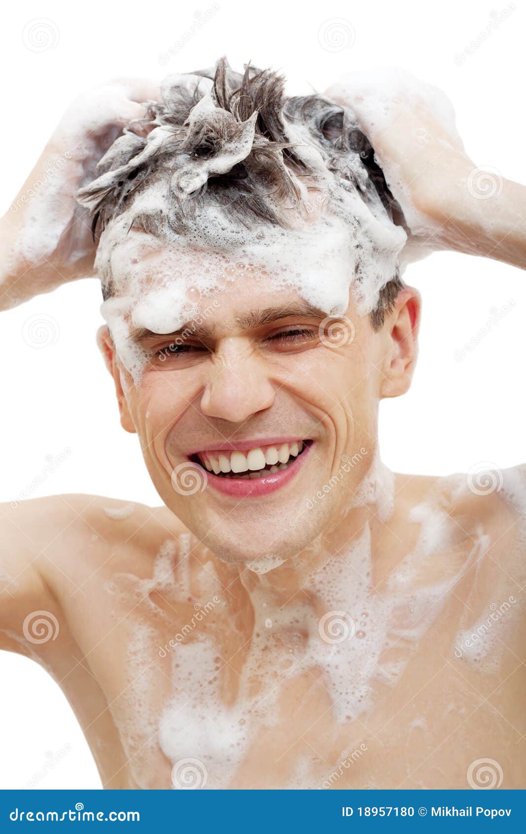 naked man with shampoo over hair