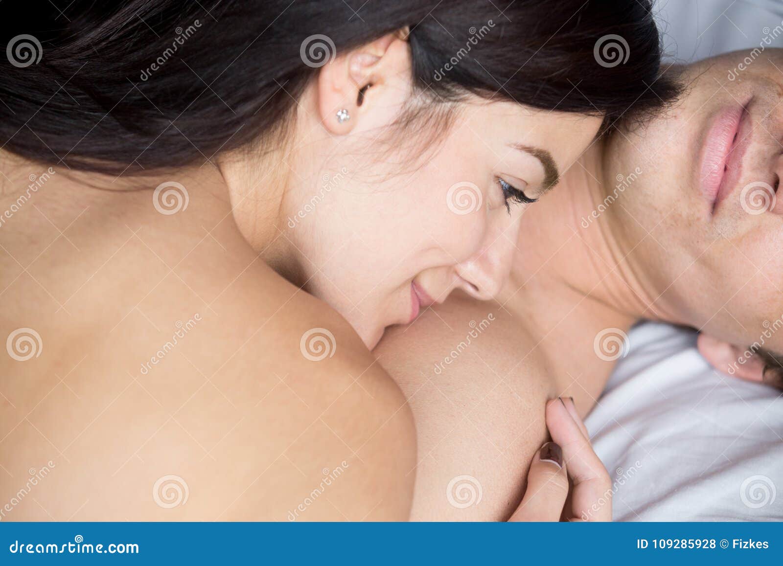 Naked Satisfied Couple Relaxing after Sex Together, Close Up Vie Stock Photo photo