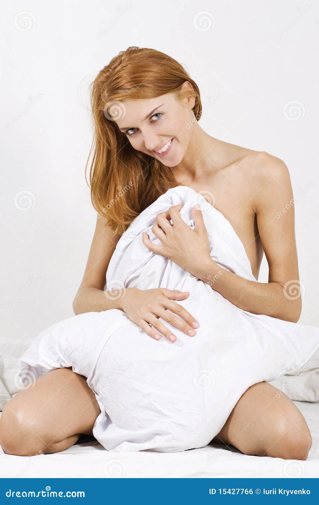 naked woman covered by the blanket