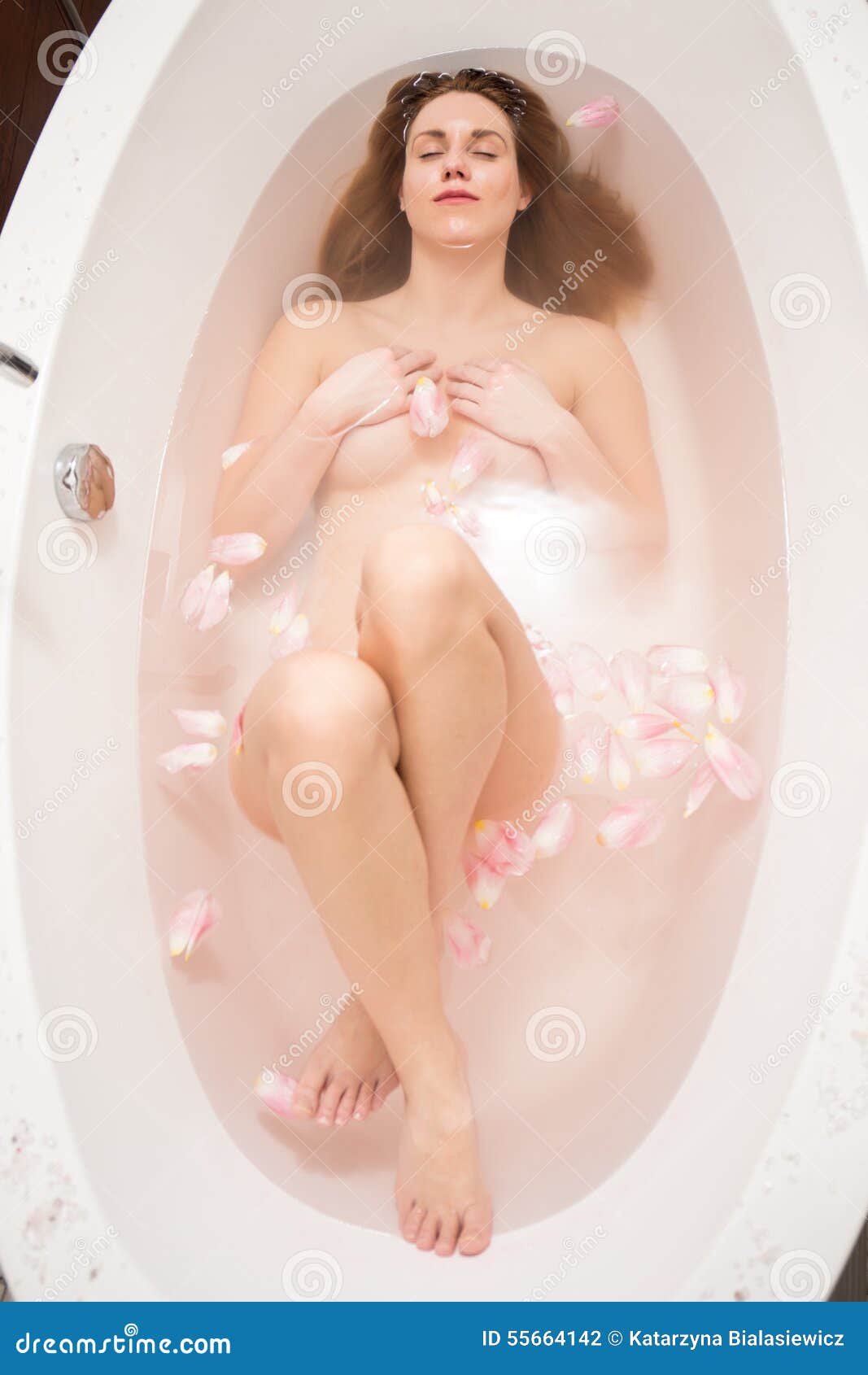 Naked in a bathtub