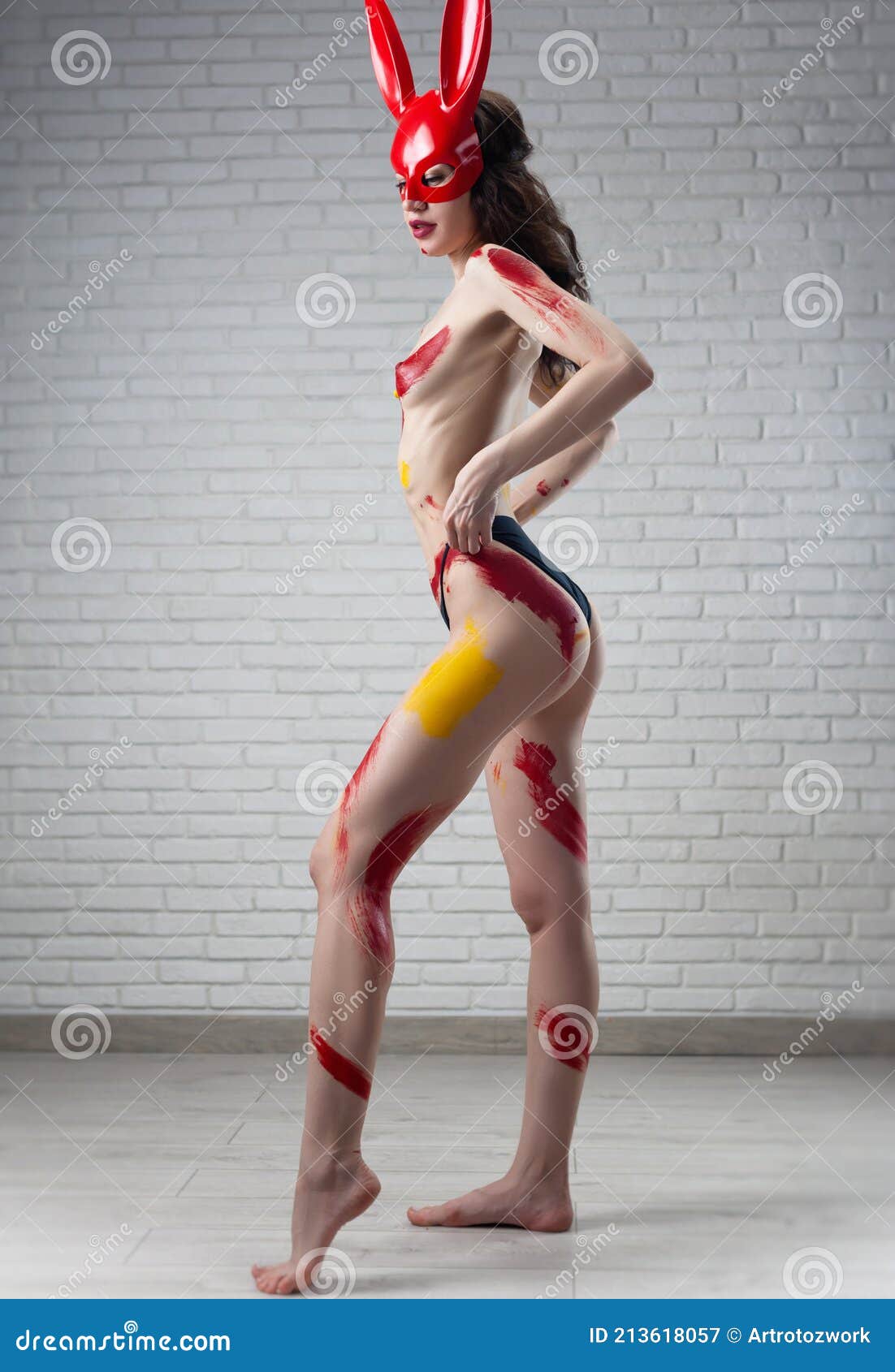 A Naked Woman in a Red Rabbit Mask Poses Against a Brick White Wall with a  Bdsm Whip Stock Image - Image of attractive, underwear: 213618057