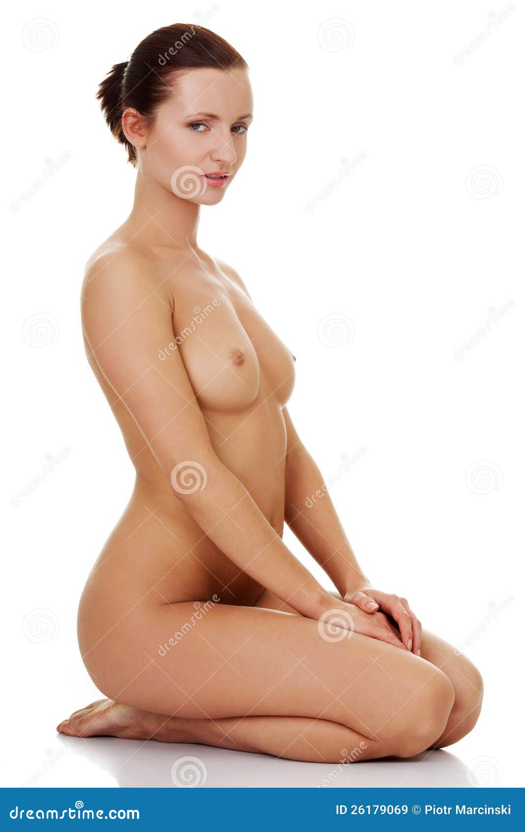 Naked woman sitting on the floor. on white backgound. 