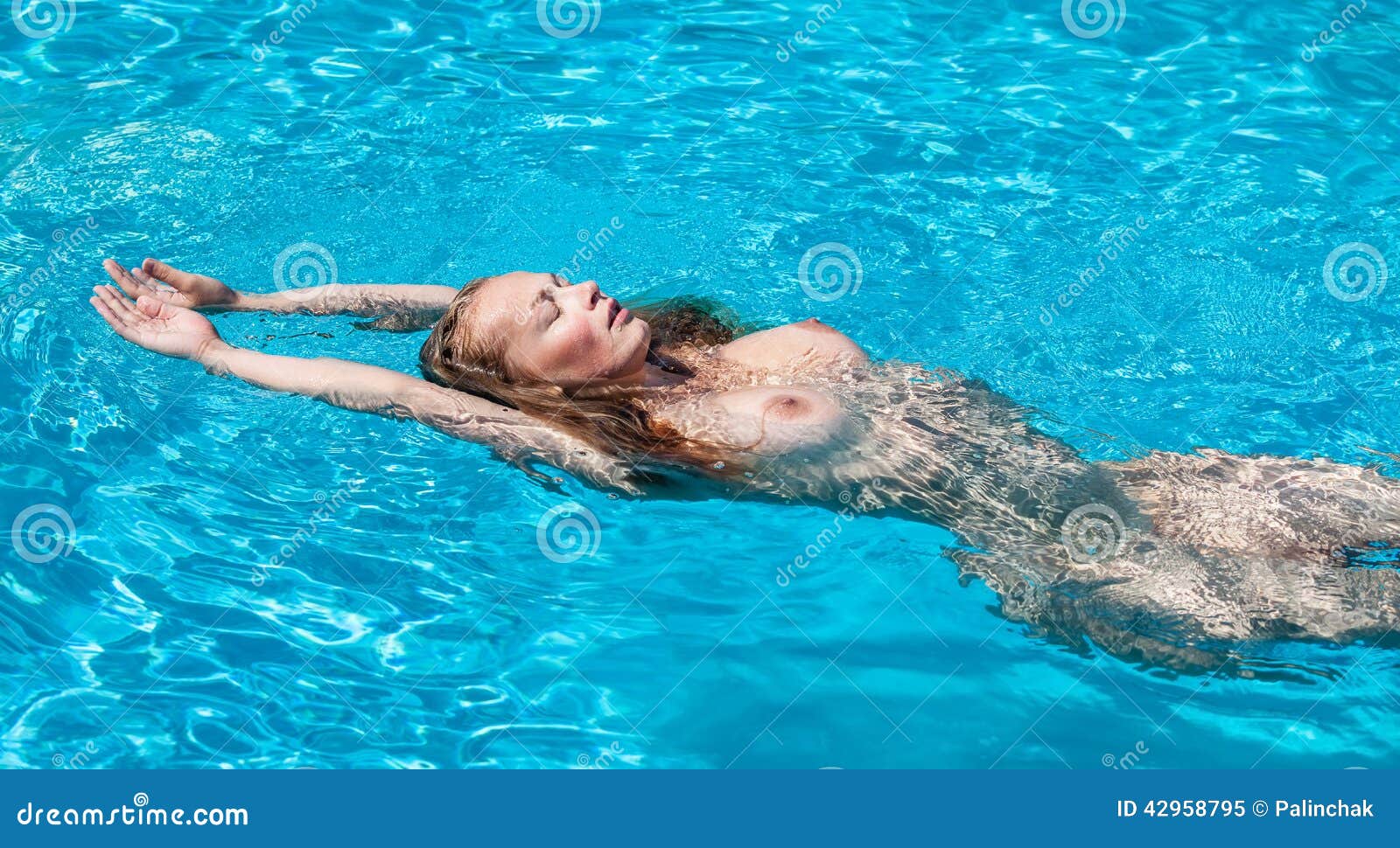 Naked Woman Swimming In Water