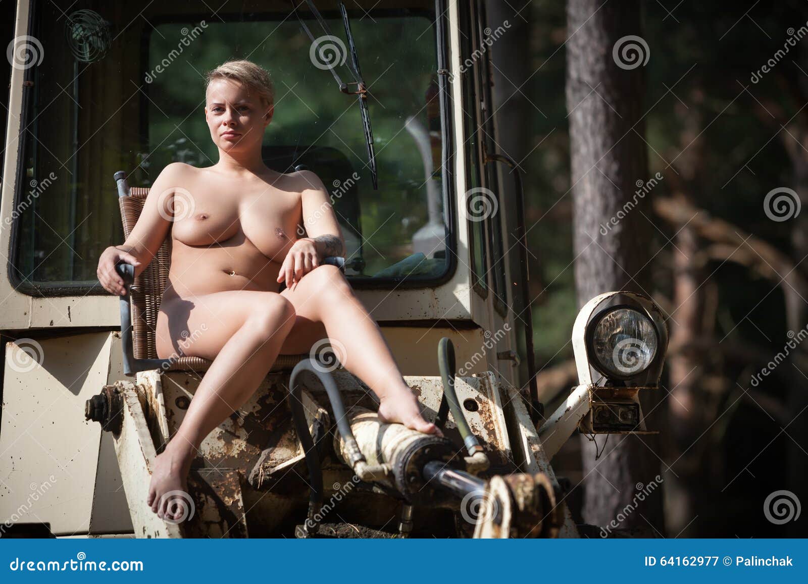 Nude on tractor