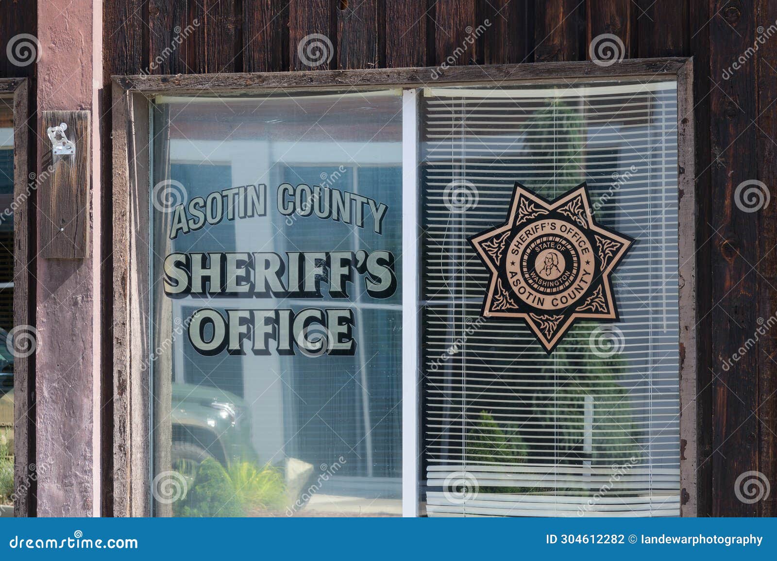 Name and Shield on Window of Asotin County Sheriff S Office Editorial