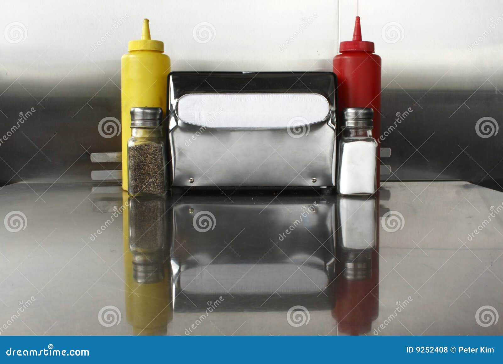 Napkin Dispenser and Condiments Stock Photo Image of dispenser