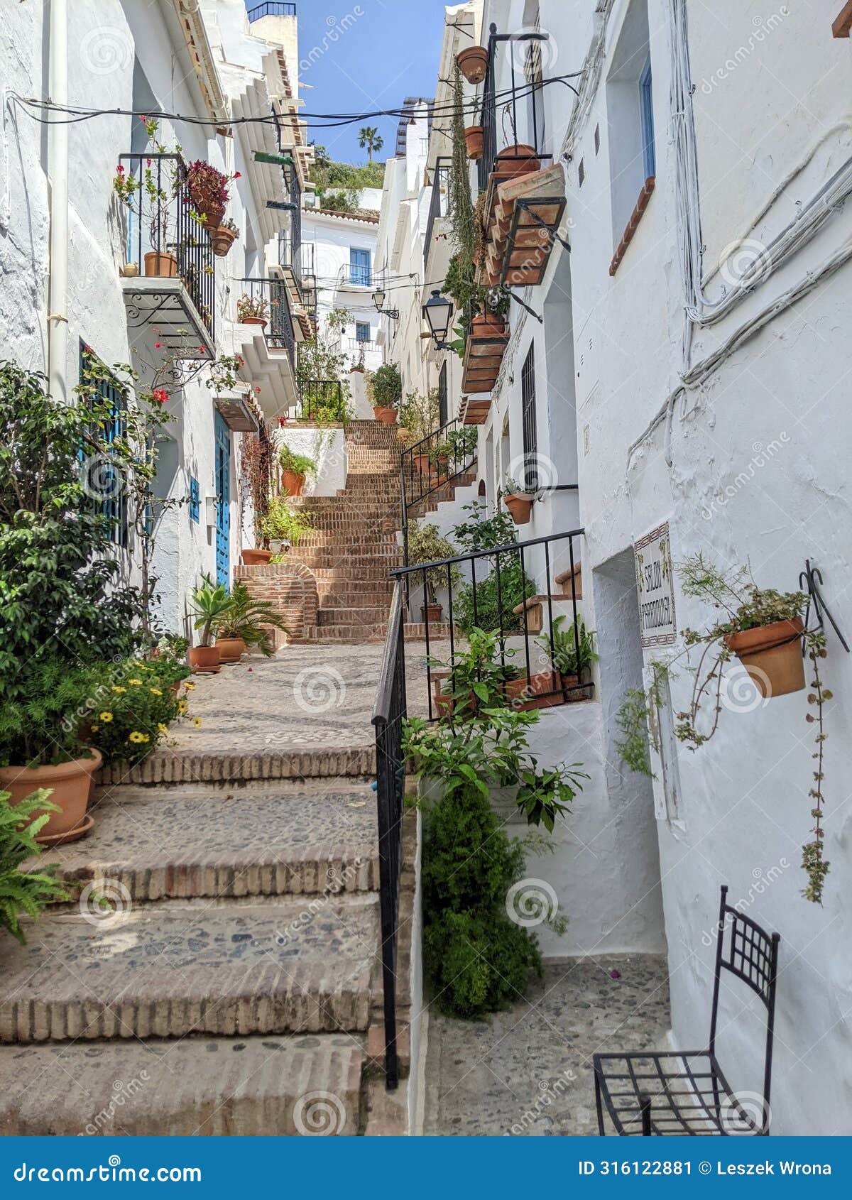 narrow ally in small andalusian town frigiliana in spain