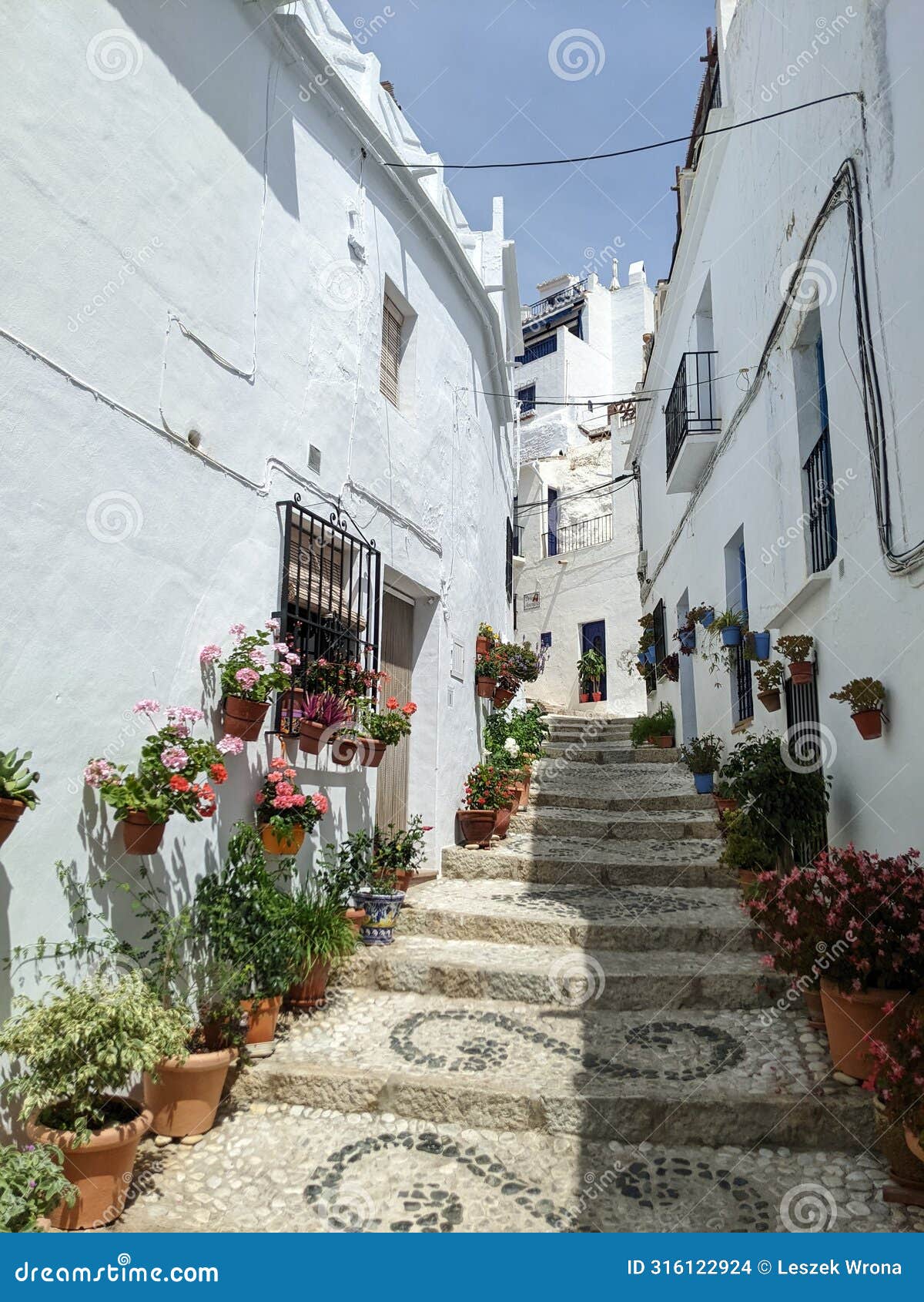 narrow ally in small andalusian town frigiliana in spain