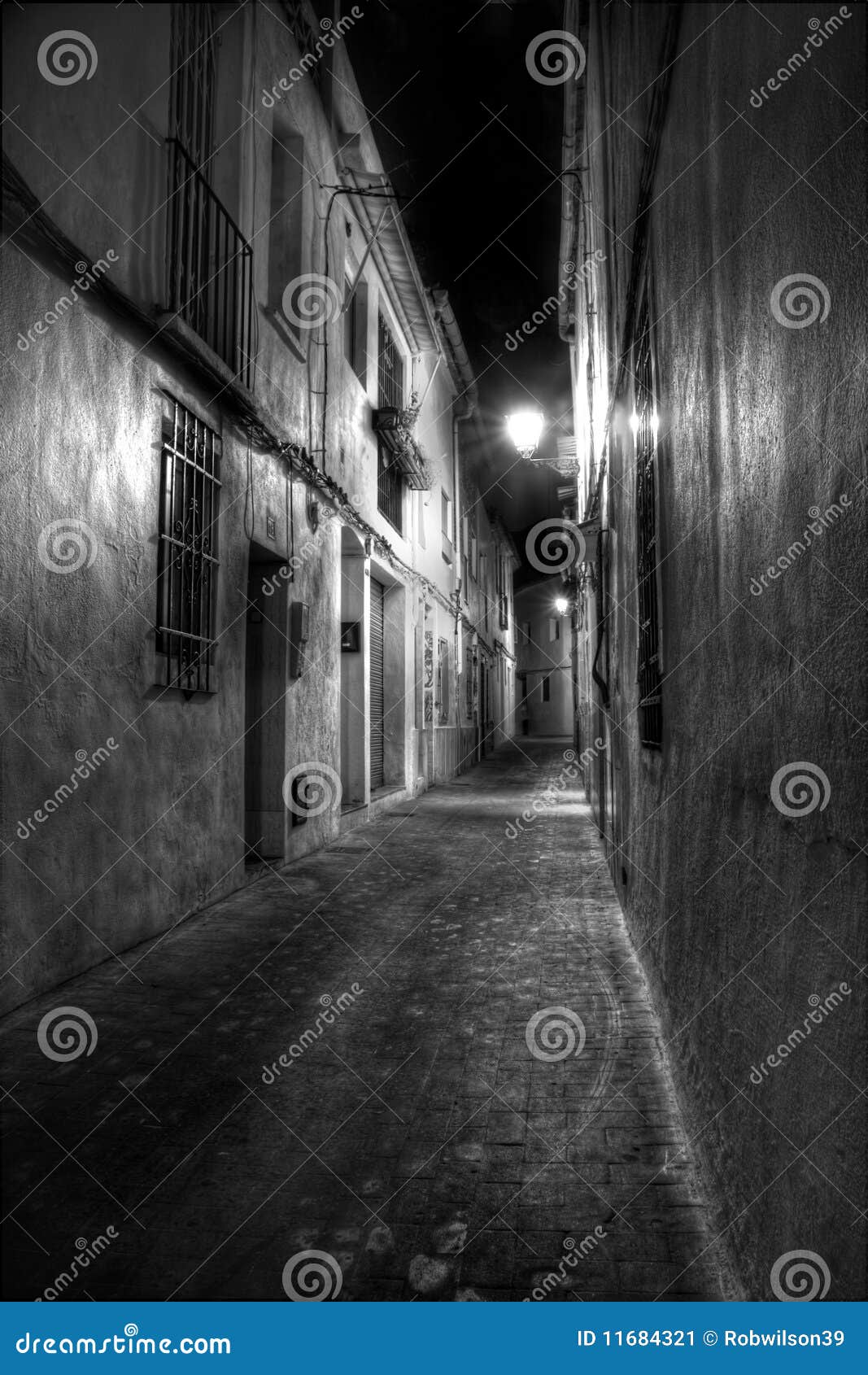 Narrow Street in Europe stock image. Image of lonely 11684321