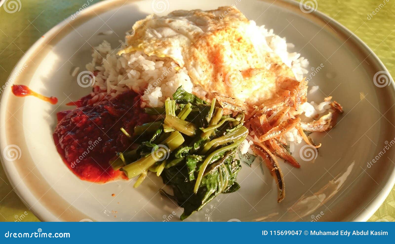 Nasi Lemak and fried egg stock image. Image of aroma ...