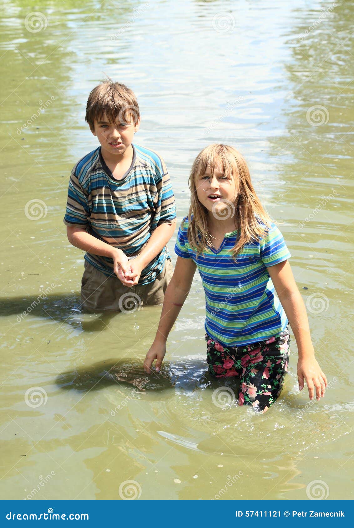 nasty kids in clothes soaking wet in water