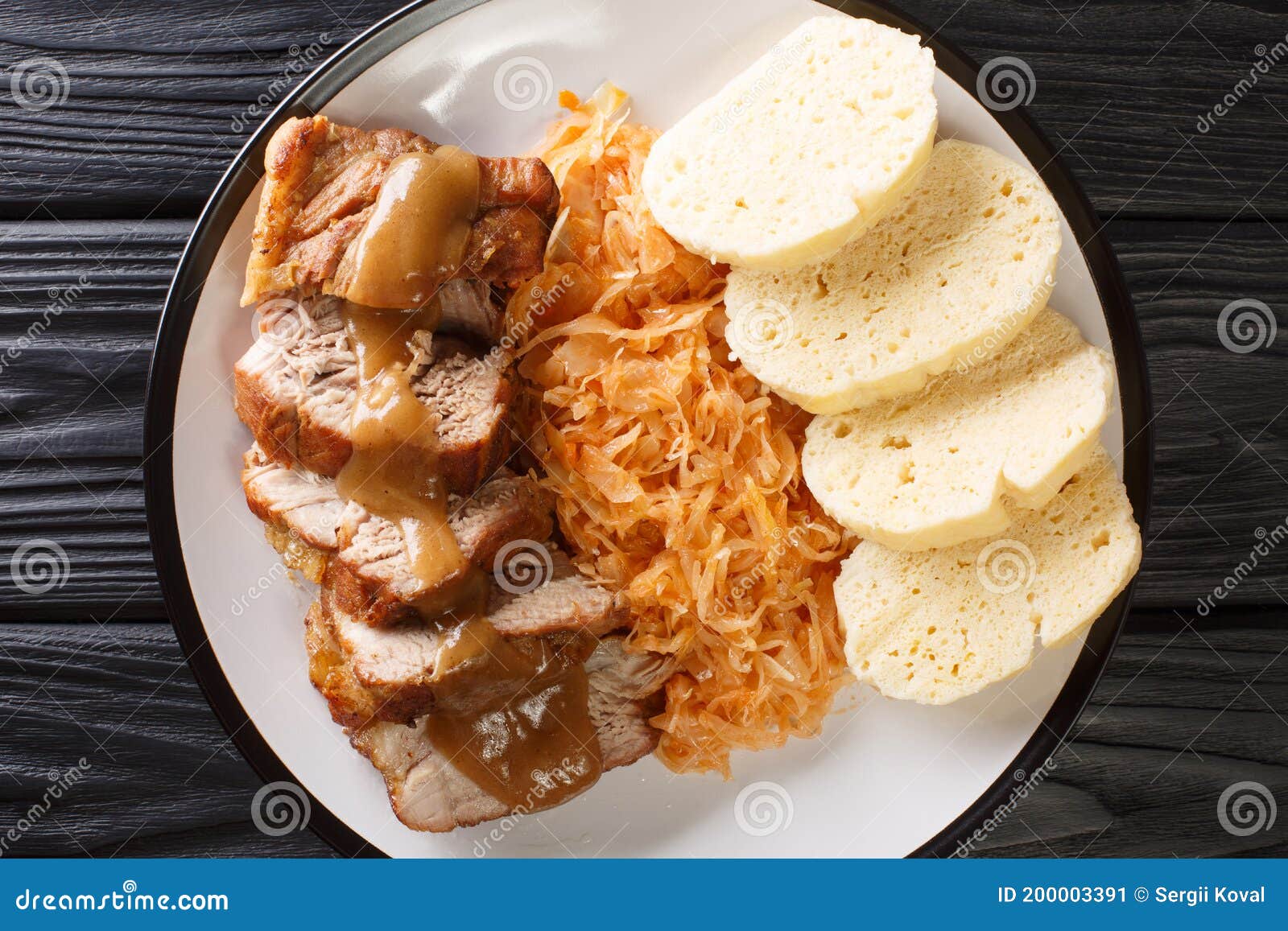 National Dish of Czech Republic Vepro Knedlo Zelo Closeup in a Plate