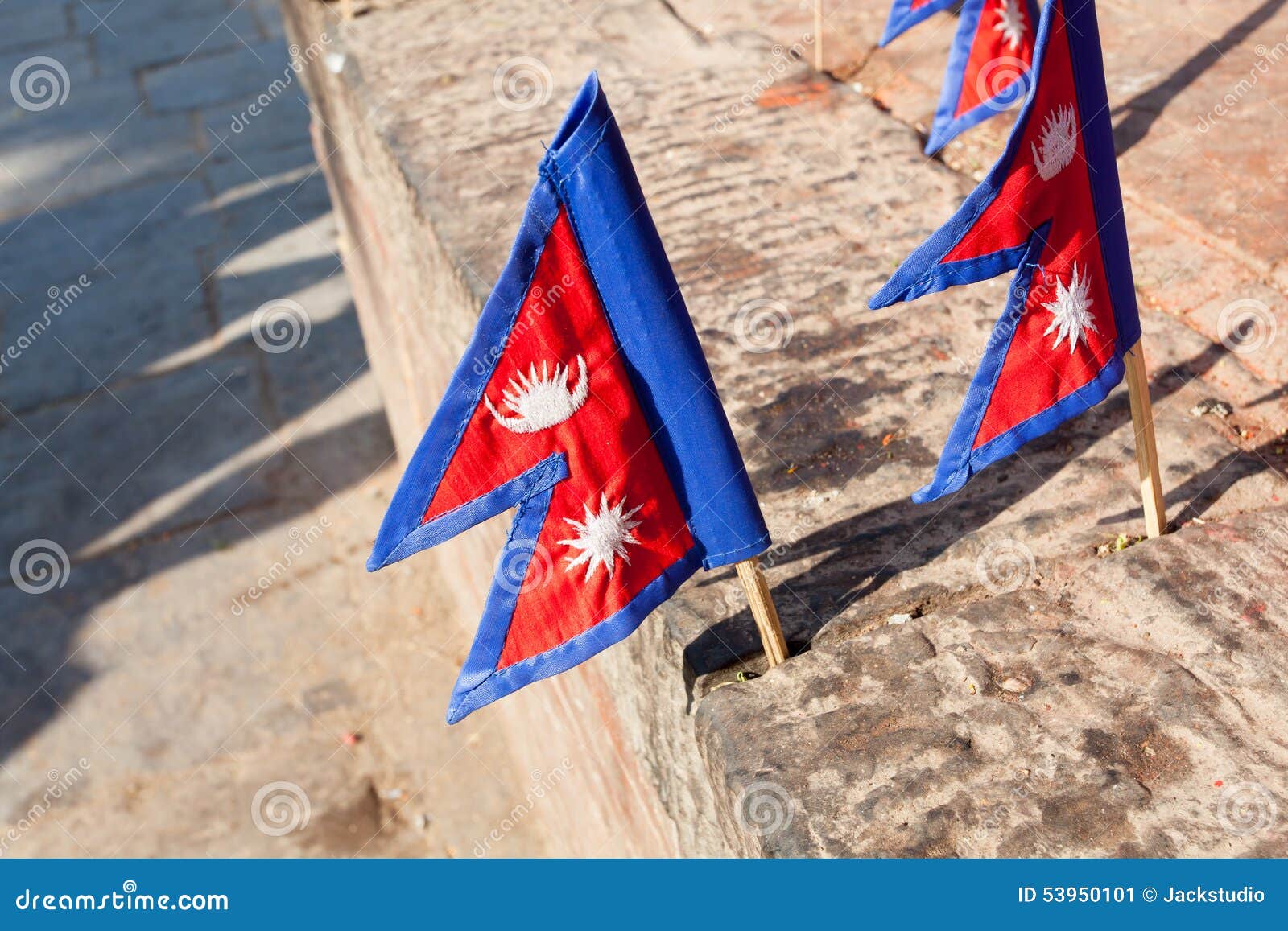 The national flag of Nepal in city