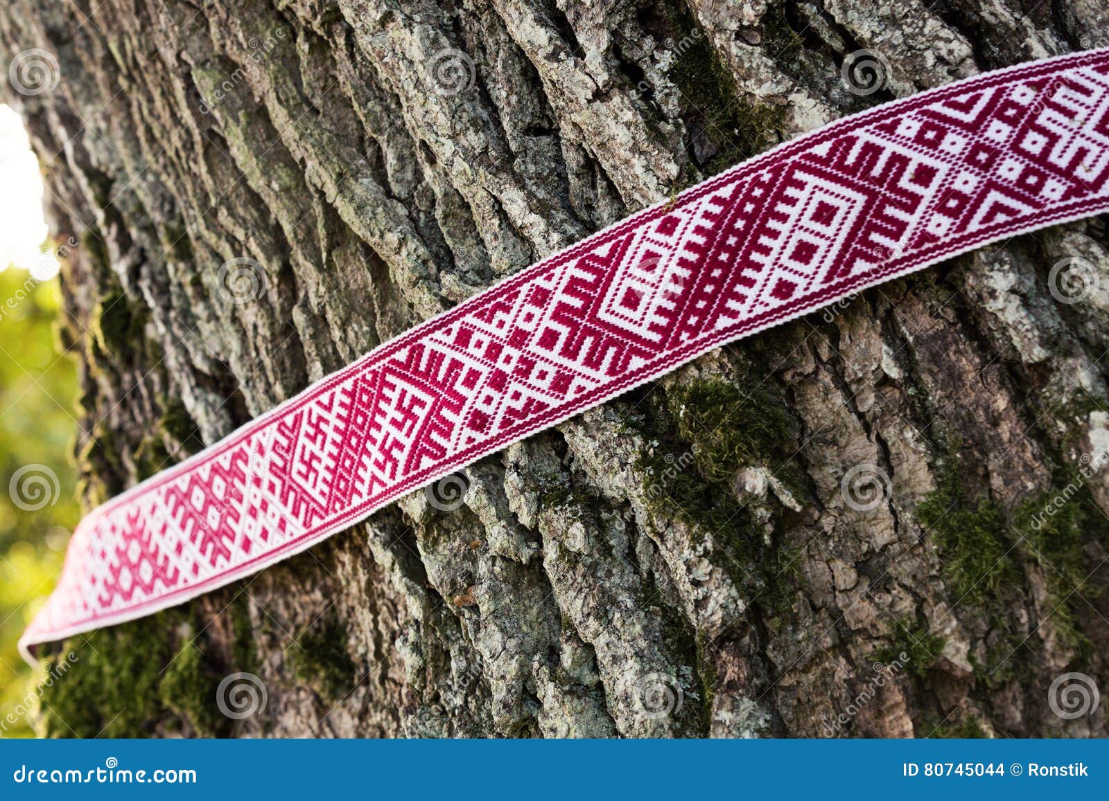 Friendship bracelets in the colours of the Latvian flag