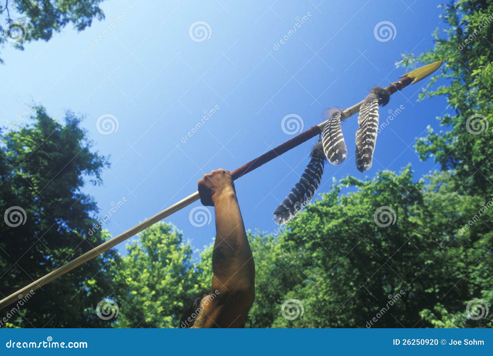 native american cherokee holding a spear