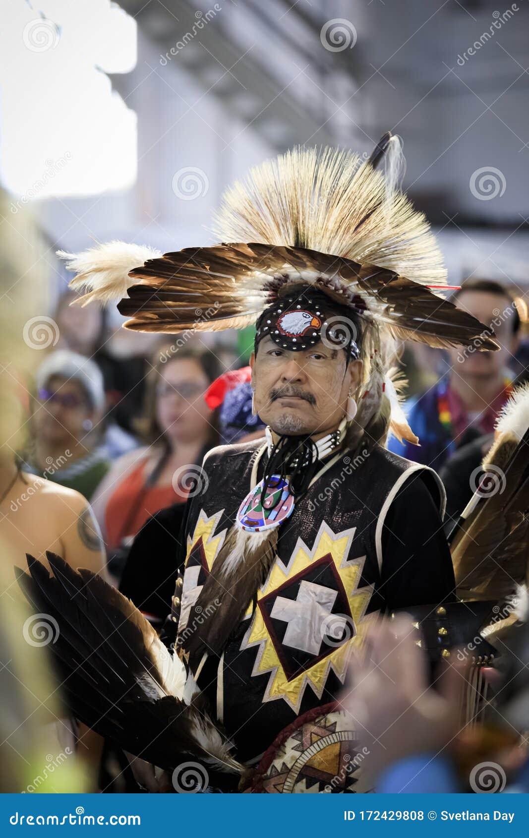 Native American in an Intricate Porcupine Roach, Eagle Feather Visor ...