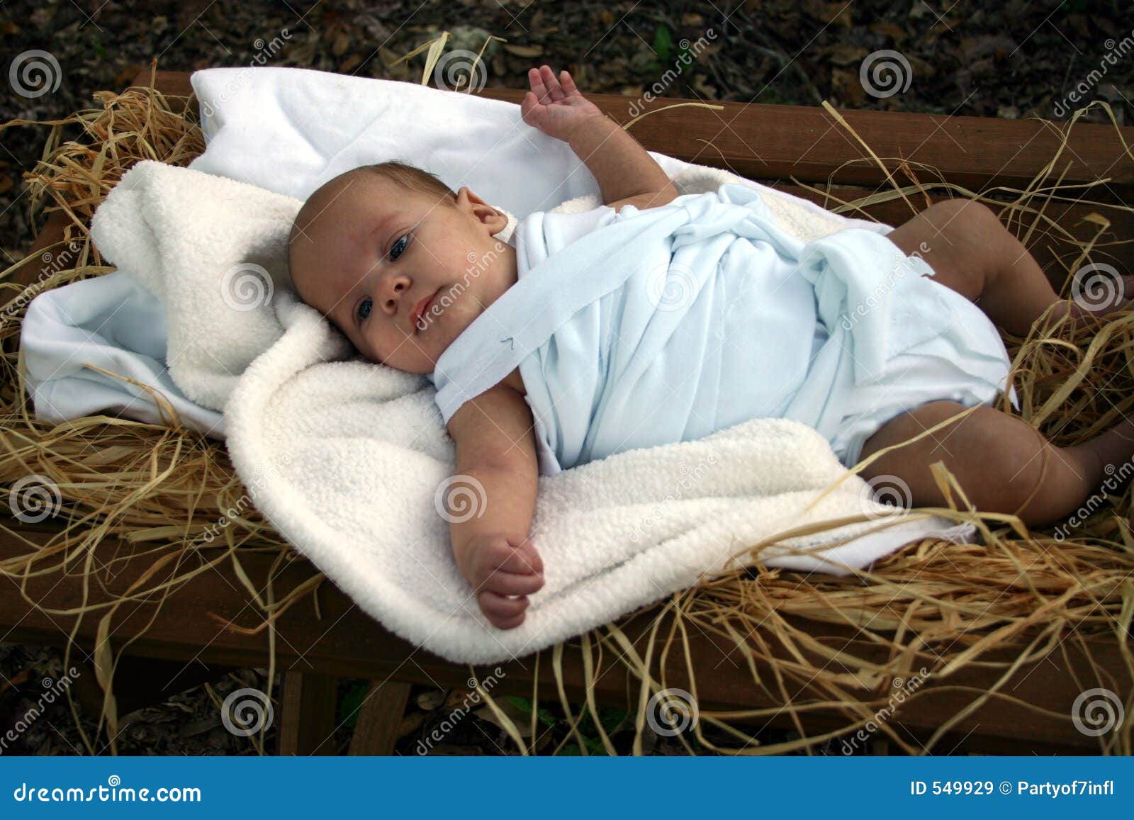 baby in swaddling clothes