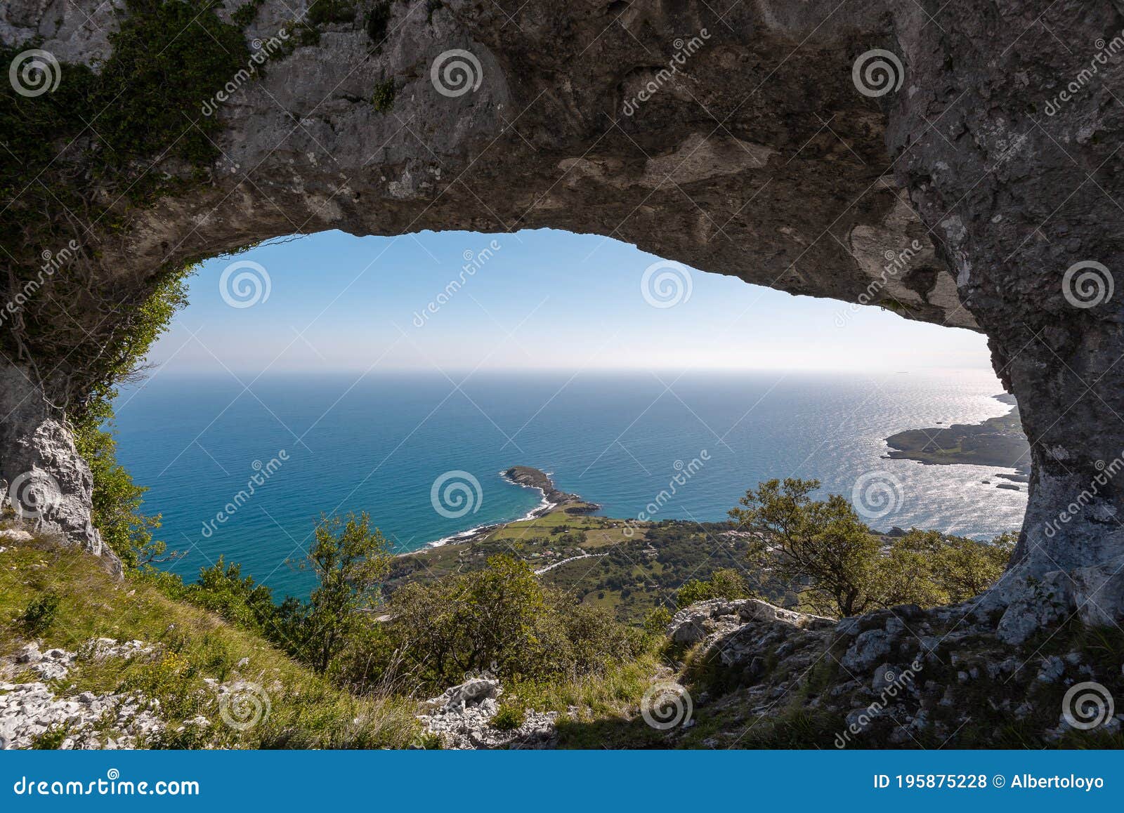 natural arch called ojo del diablo in cantabria, spain