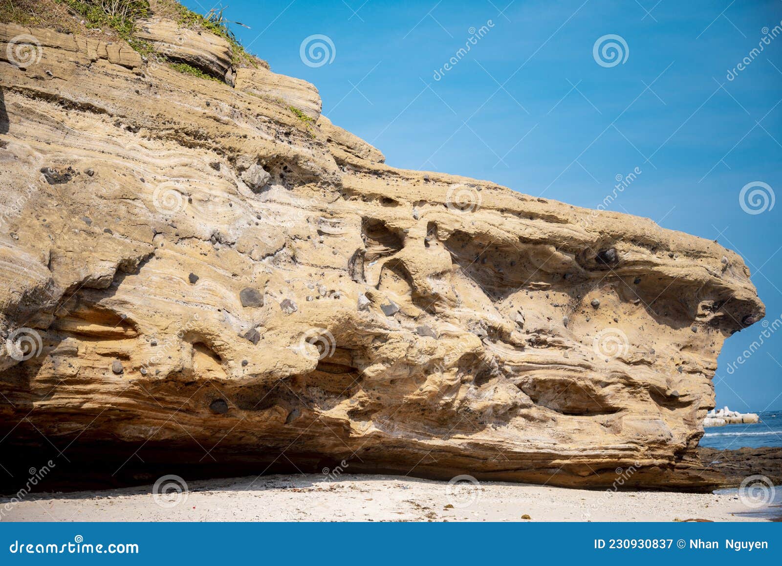 natural background. closeup edged shabby cliff cracks. gray-brown stone rock texture of mountains.