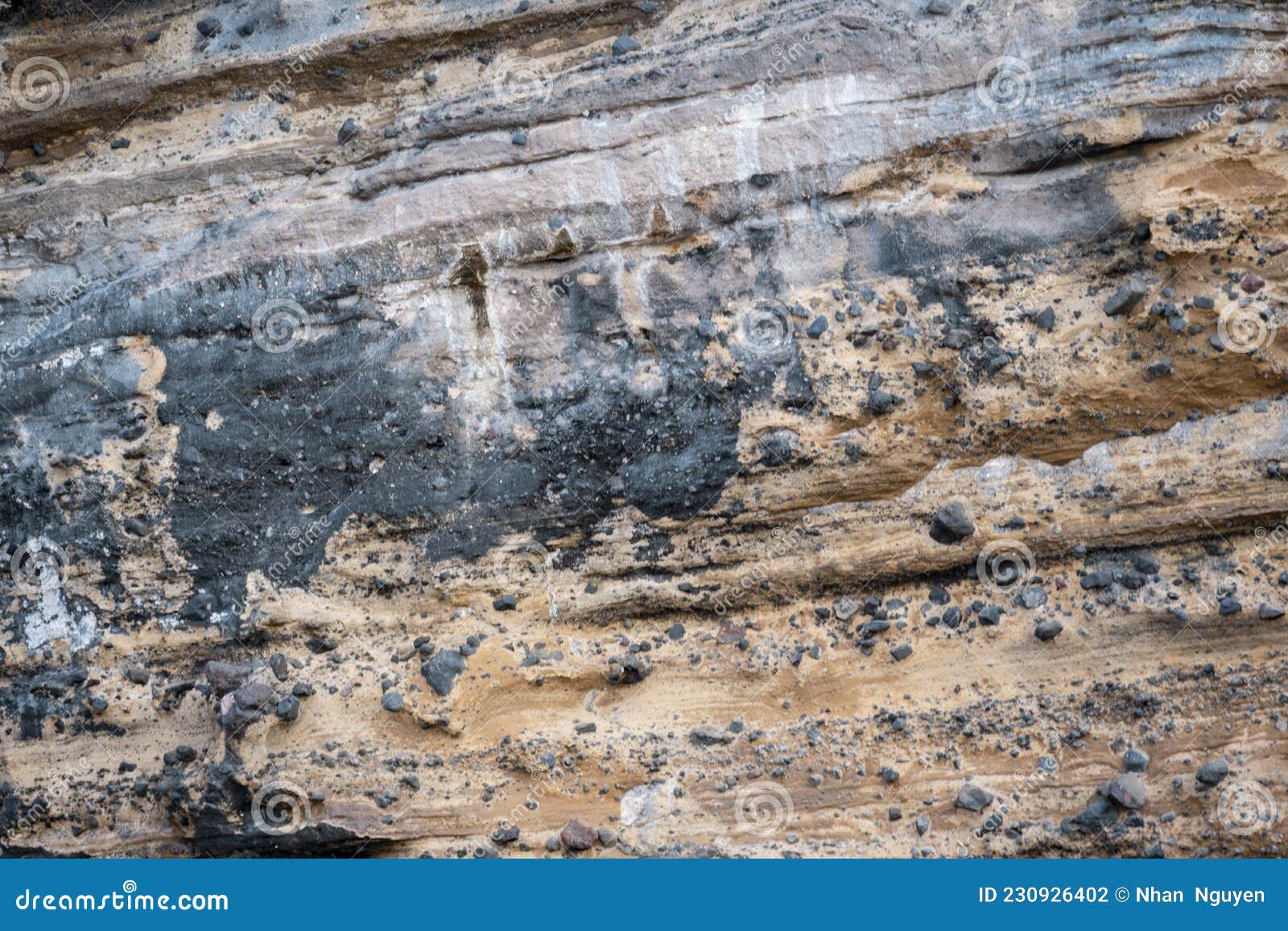 natural background. closeup edged shabby cliff cracks. gray-brown stone rock texture of mountains.