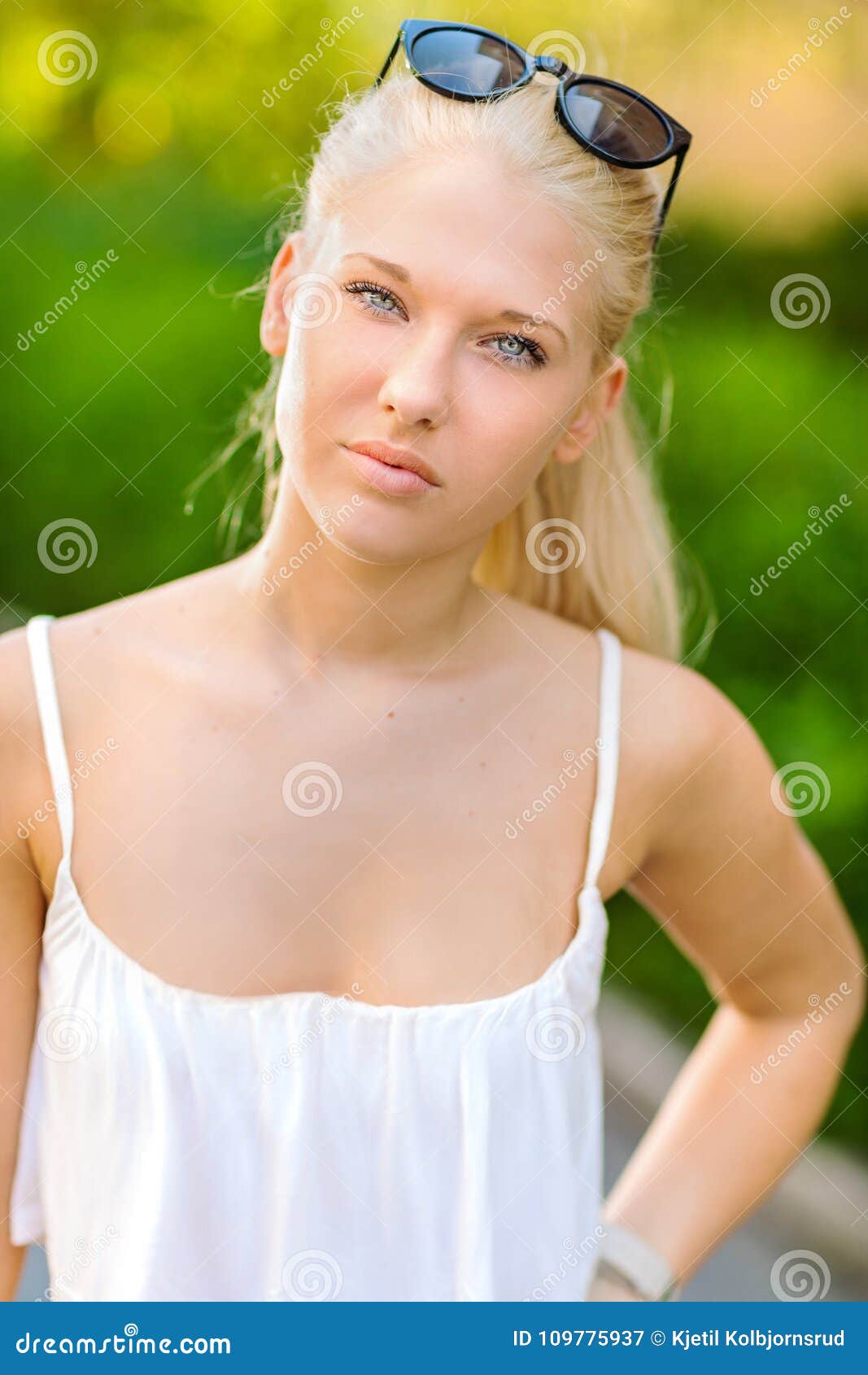 Natural Blonde Teen Girl Standing in the Street in the Sun Stock Image ... picture pic