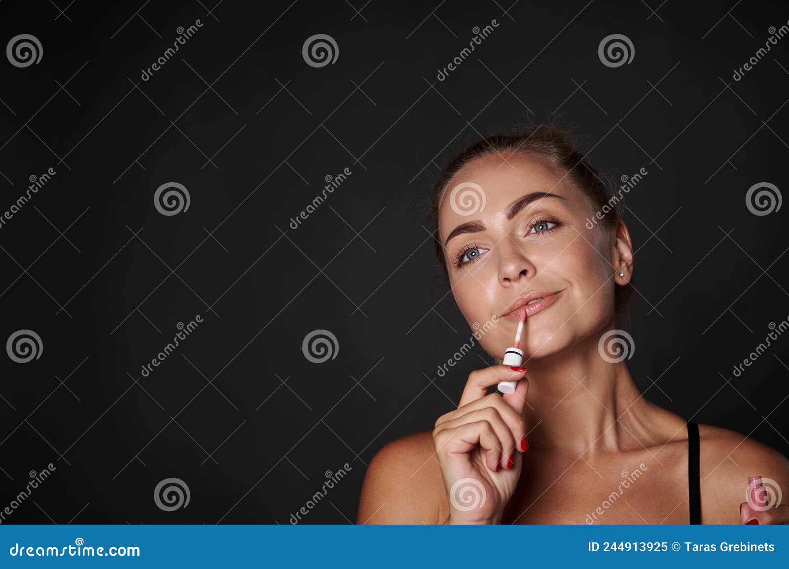 Beautiful Woman Applying Lip Gloss On Her Lips Attractive Blonde Woman With Moisturizing