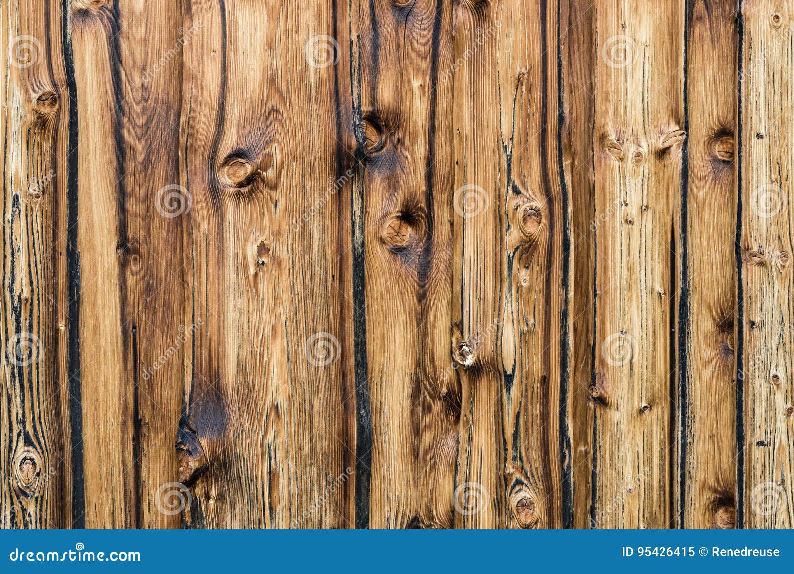 natural brown barn wood wall. wall texture background with copyspace.