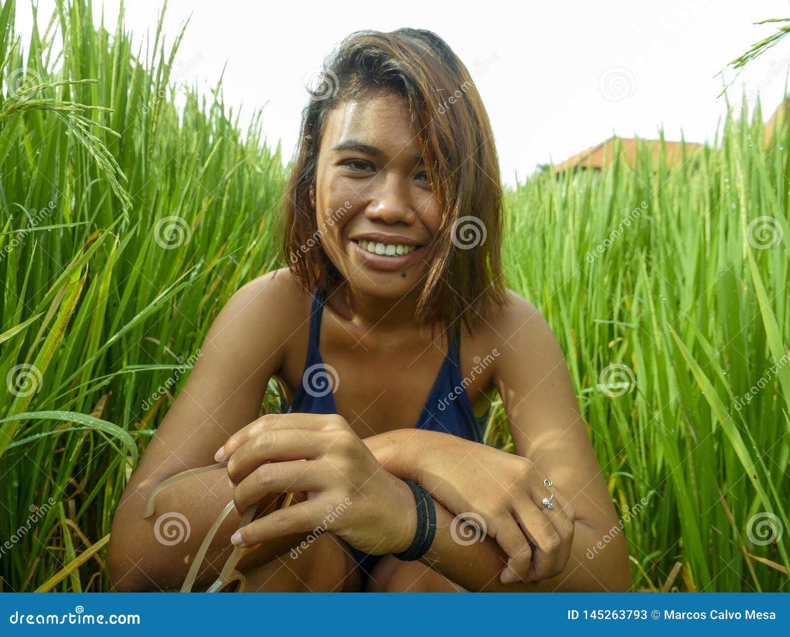 Natural And Fresh Portrait Of Young Happy And Exotic Islander Asian 