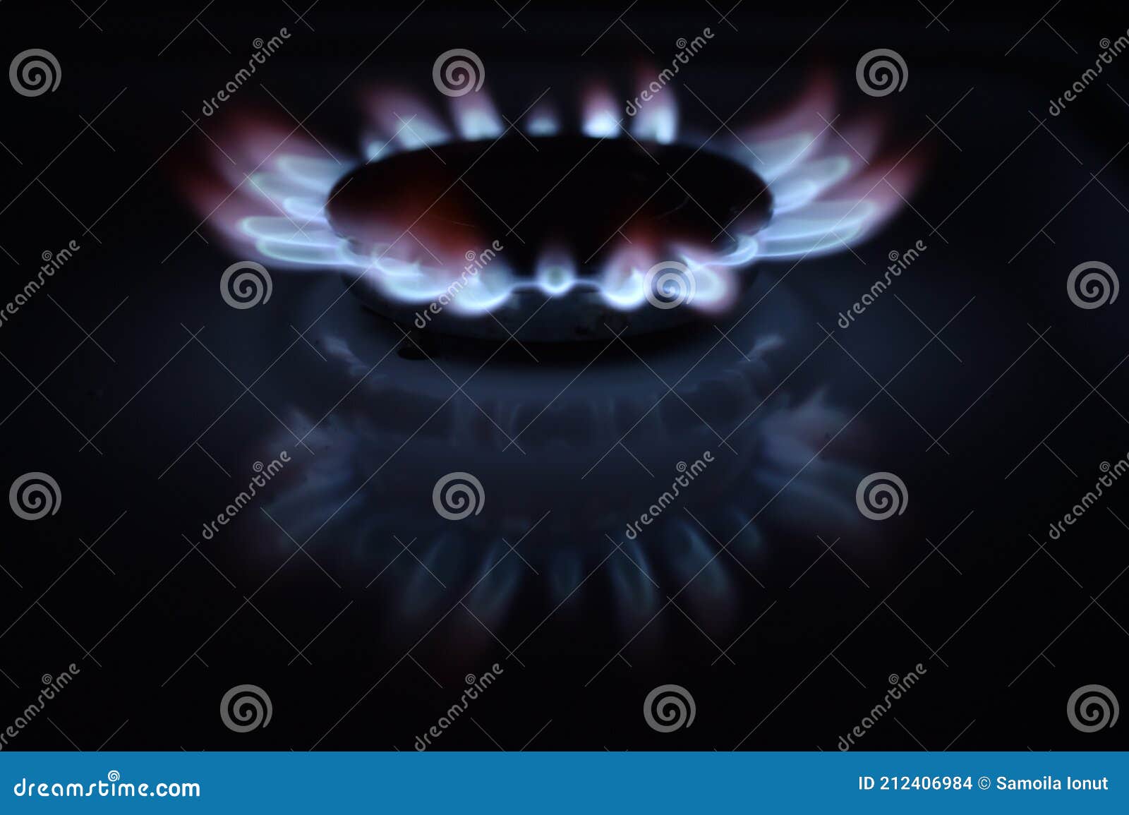 Natural Gas Burning a Blue Flames on Black Background Stock Photo