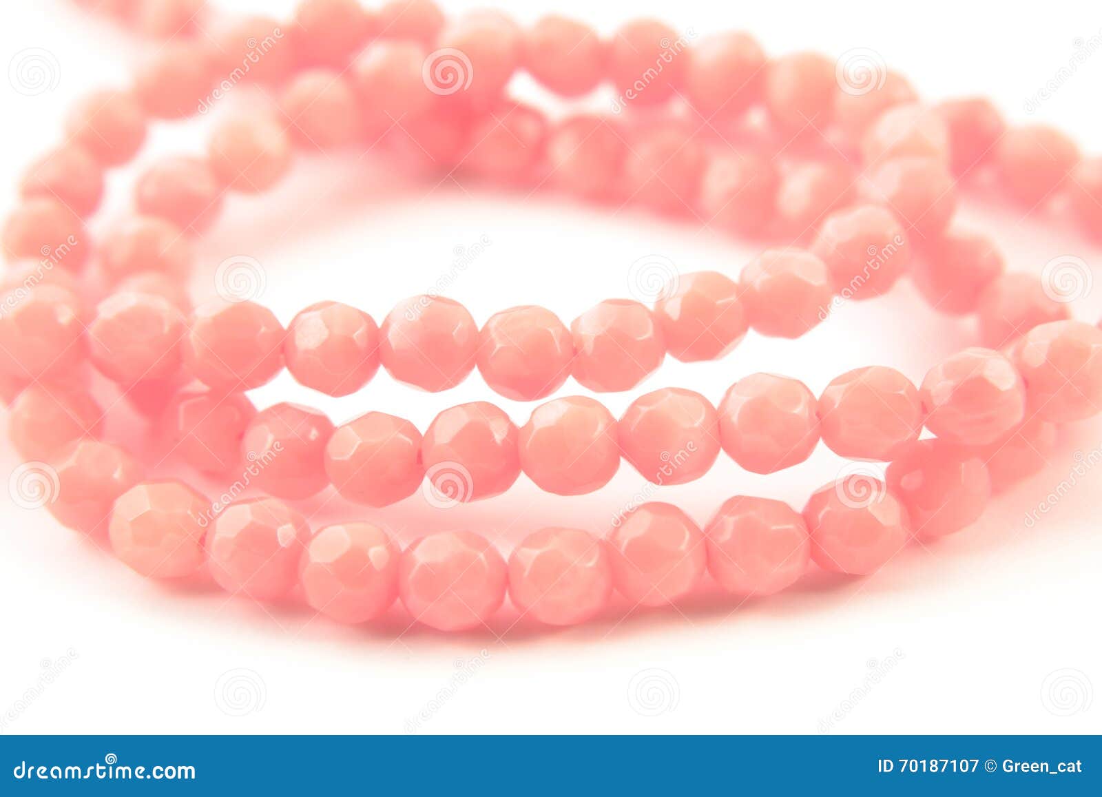 Natural Gemstone Pink Coral Beads on a White Background Stock Image