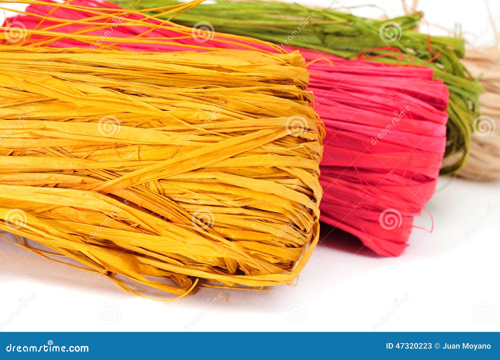 Closeup shot of a raffia ribbon for gift wrapping isolated on
