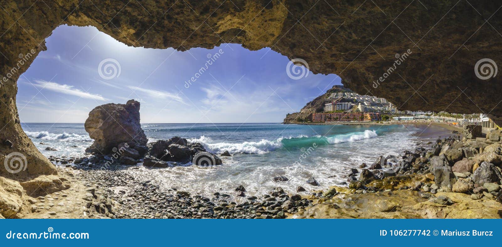 natural rock grotto on the beach on playa del cura, near playa a