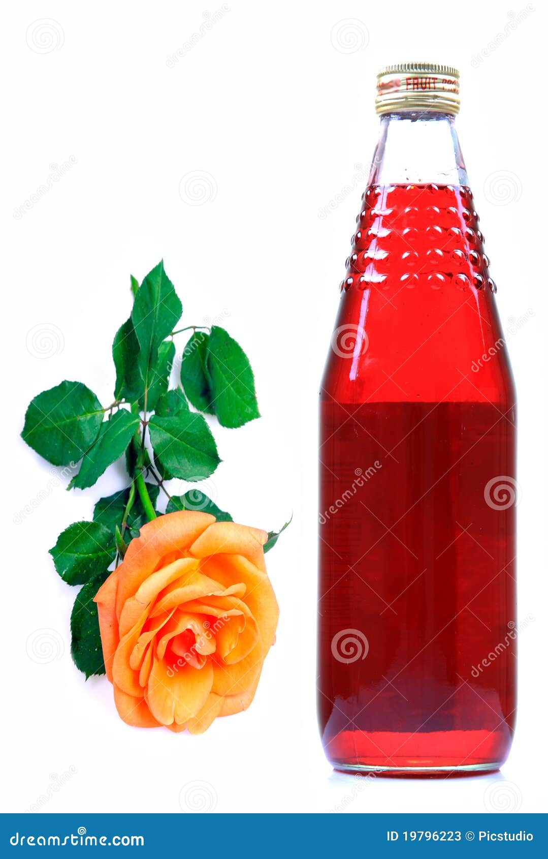 Rose Syrup,ROSA Syrup With Rose Petals On A Wooden Surface Are The