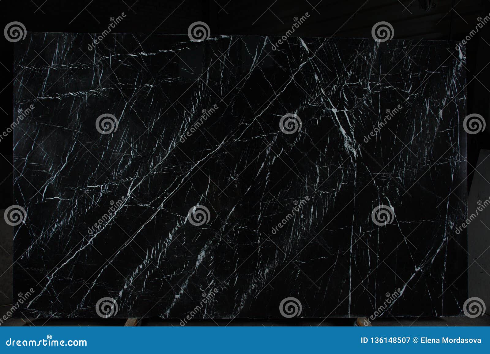 natural stone is black marble with an interesting pattern called nero marquina