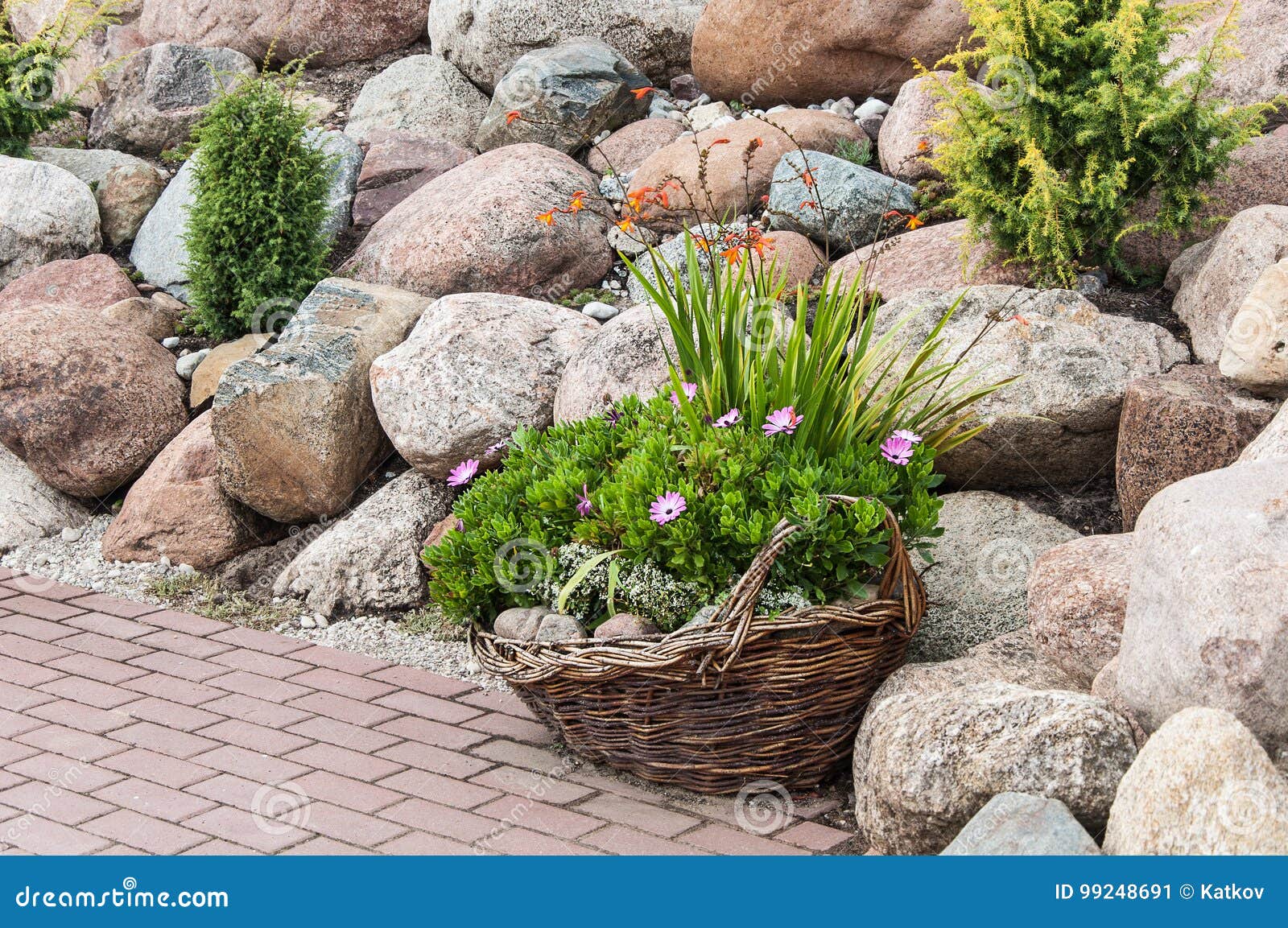 Natural stone in garden stock image. Image of basket 99248691